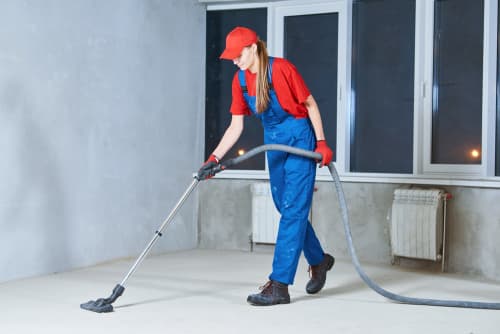 What are the phases of post-construction cleaning