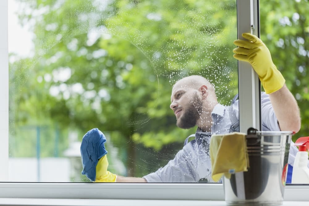 What do professional window cleaners use to clean windows
