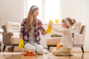 At what age should a child clean up after themselves